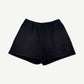 Chrome Hearts black sweat shorts with triple cross leather patches stacked on right leg, elastic waist front