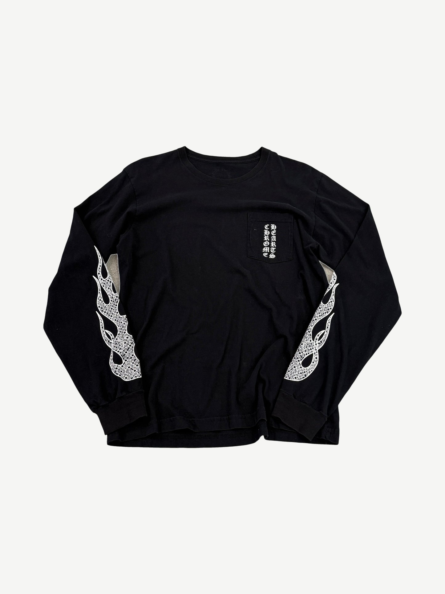 Chrome Hearts black long sleeve tee with vertical pocket logo and white floral flame sleeve graphic prints.