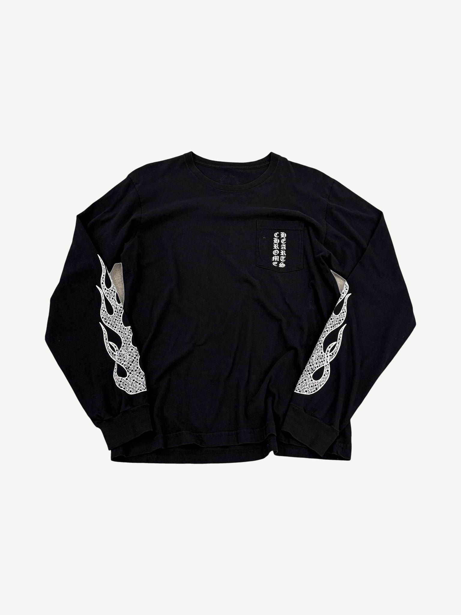 Chrome Hearts black long sleeve tee with vertical pocket logo and white floral flame sleeve graphic prints.