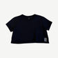 Chrome Hearts black womens cropped tee with white gothic Chrome Hearts vertical embroidery at hem