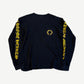 Chrome Hearts black longsleeve front with yellow horseshoe pocket logo and yellow gothic script down both sleeves