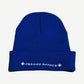 Back of Chrome Hearts blue beanie with embroidered Chrome Hearts script and dagger motifs on cuff.