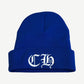 Chrome Hearts blue watch beanie in ribbed royal knit with white embroidered Old English CH on cuff.