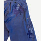 Chrome Hearts blue French work pants detail, dense layered cross leather patches in navy and purple tones.
