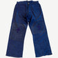 Chrome Hearts blue French work pants front with tonal purple and navy leather cross patches on both knees.
