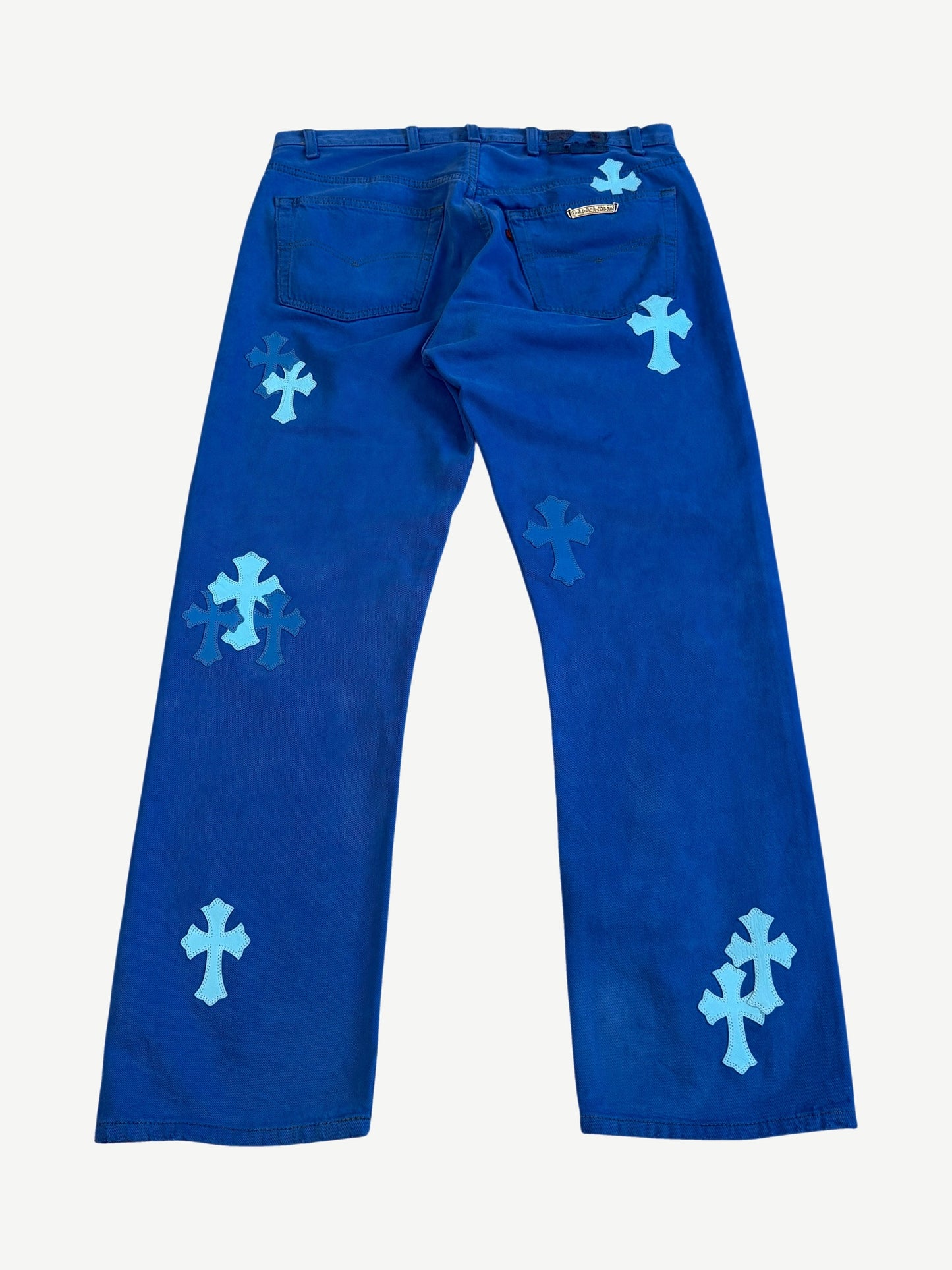 Chrome Hearts London blue cross patch jeans back, royal blue with tonal leather cross patches and CH plaque.