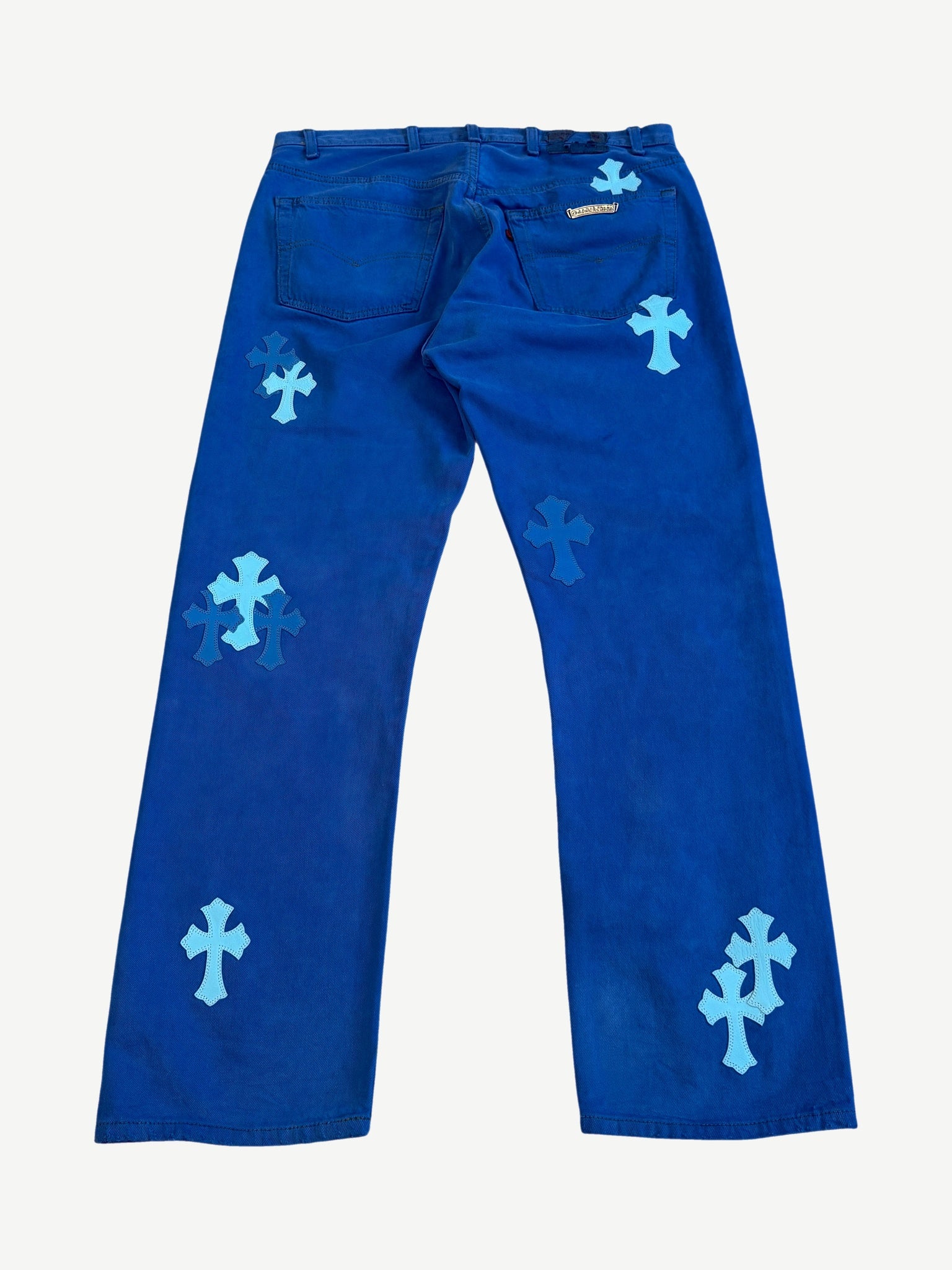 Chrome Hearts London blue cross patch jeans back, royal blue with tonal leather cross patches and CH plaque.