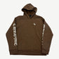 Chrome Hearts brown hoodie front with small CH chest embroidery and tonal gothic sleeve text