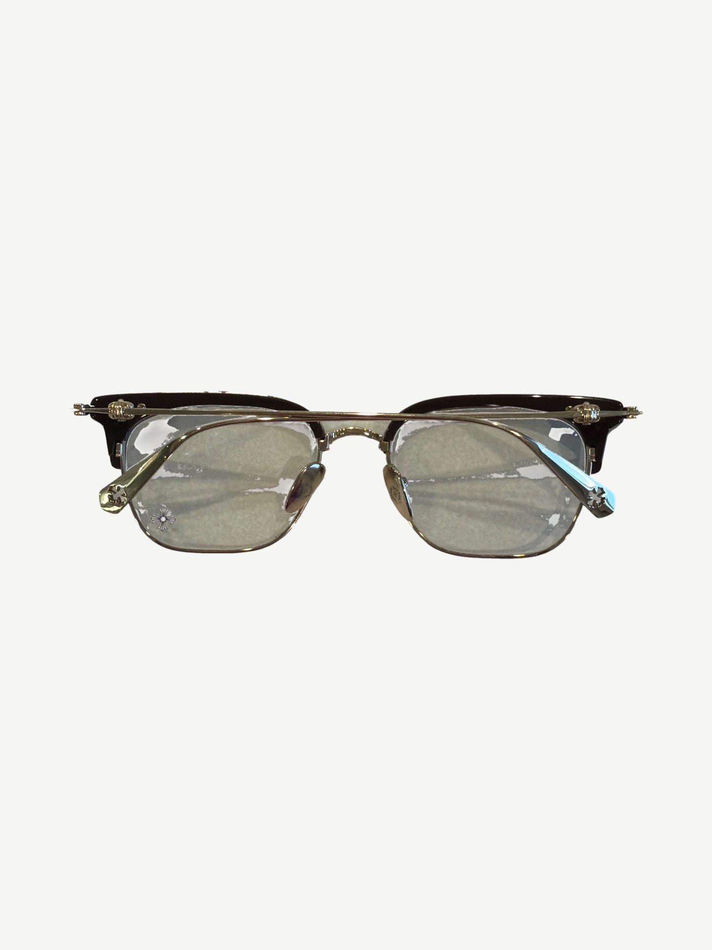 Front view of Chrome Hearts Sluntradiction clubmaster glasses showing brown brow bar and silver cross hardware