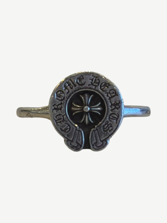 Chrome Hearts sterling silver Bubblegum horseshoe signet ring with engraved CH lettering and cross at center.