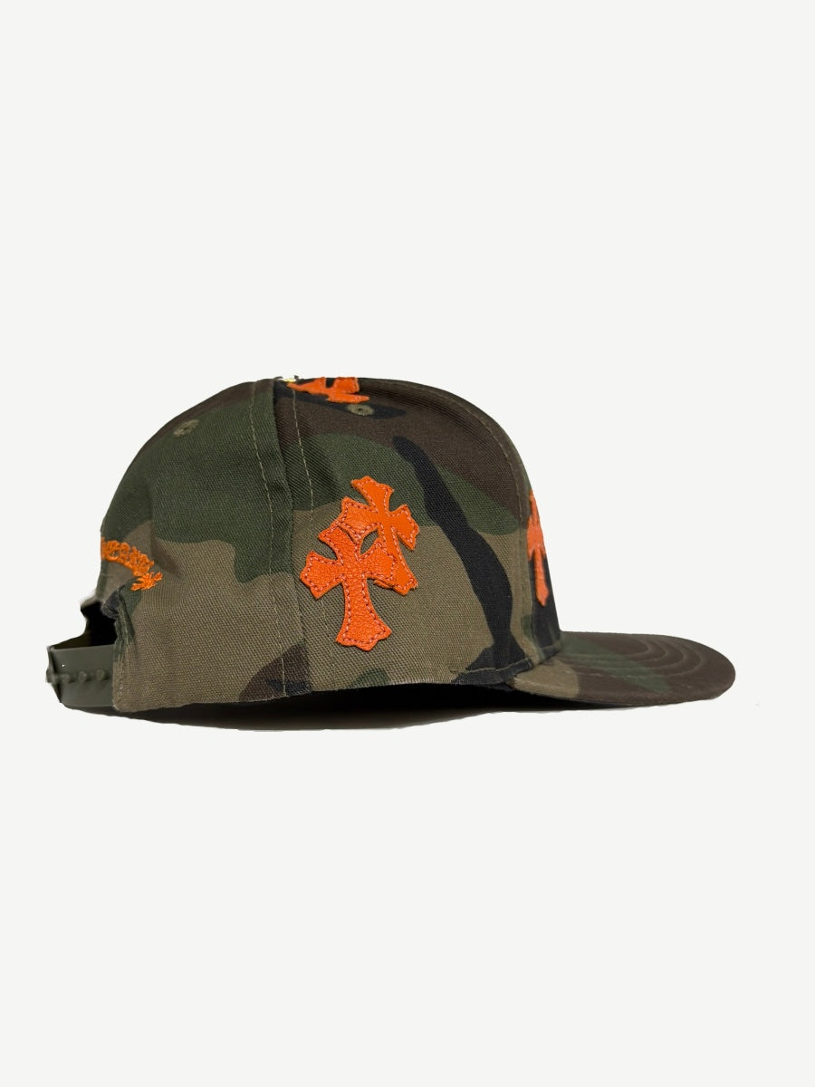 Chrome Hearts camo baseball cap side view with orange leather cross side panel patches