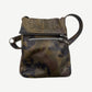 Chrome Hearts camo leather crossbody bag with silver triple cross plaque and adjustable strap, front view