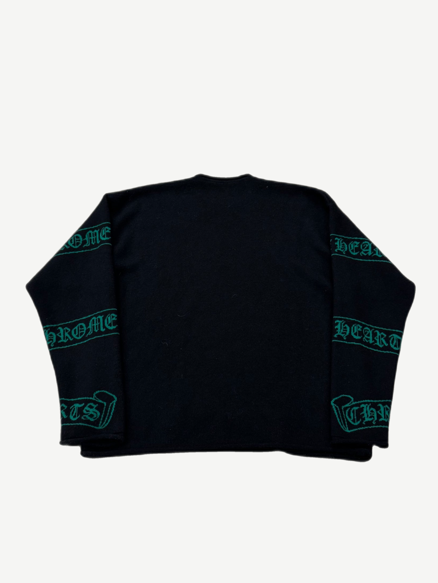 Chrome Hearts black cashmere sweater detail showing green knit Chrome Hearts gothic scroll on sleeve