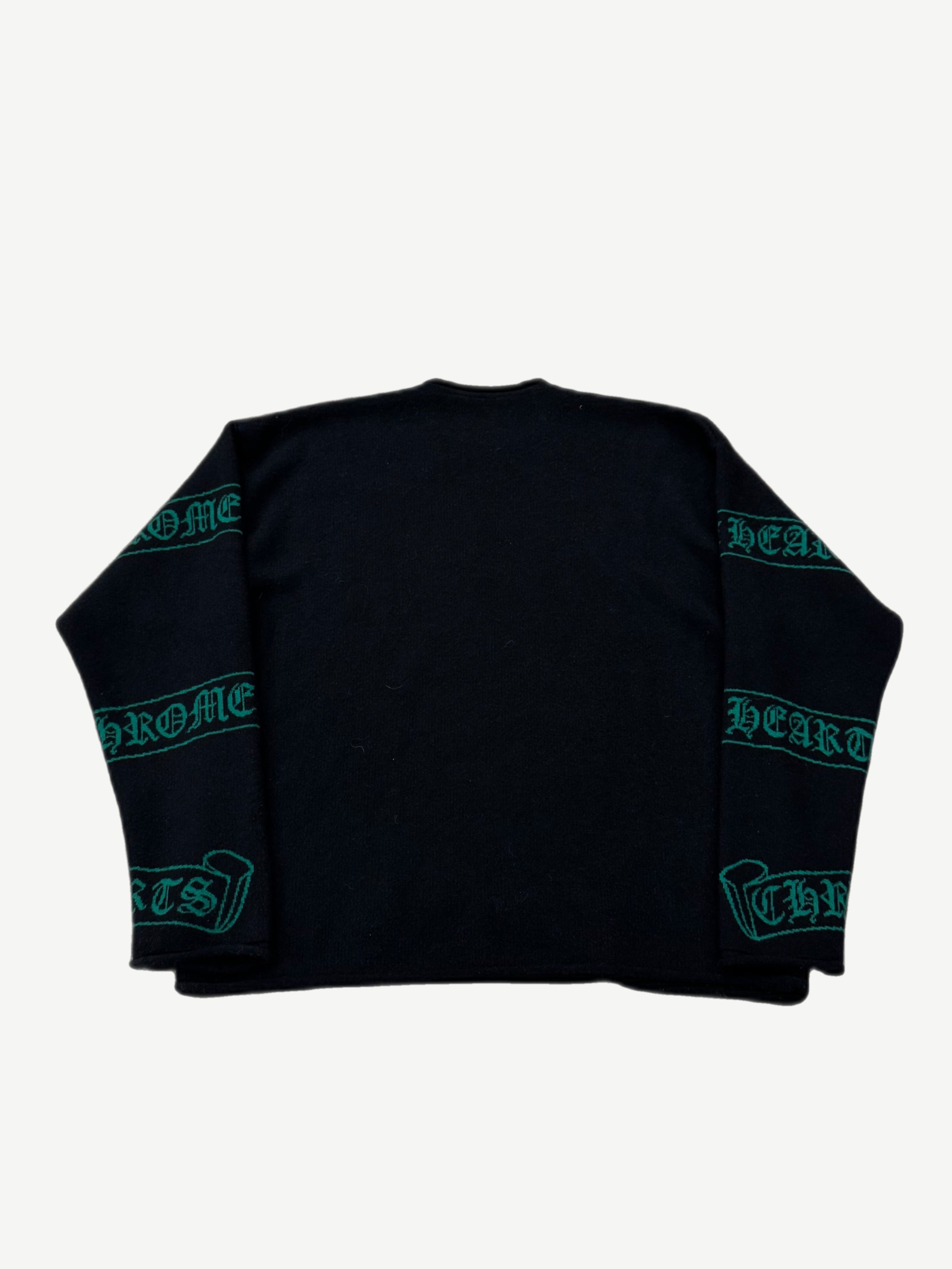 Chrome Hearts black cashmere sweater detail showing green knit Chrome Hearts gothic scroll on sleeve