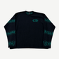 Chrome Hearts black cashmere crewneck sweater with green CH chest logo and scroll banner sleeve intarsia
