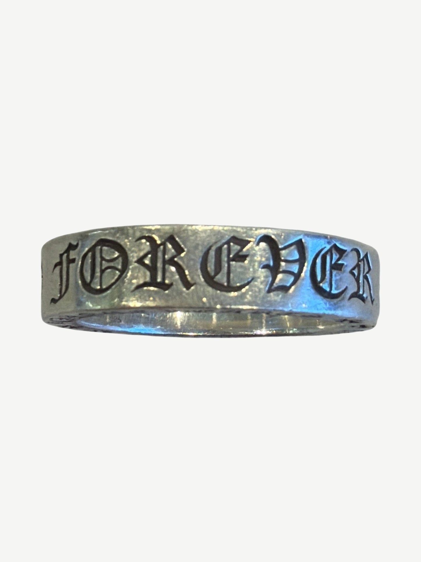 Chrome Hearts CH Forever ring side view in sterling silver with engraved gothic FOREVER text and black enamel fill