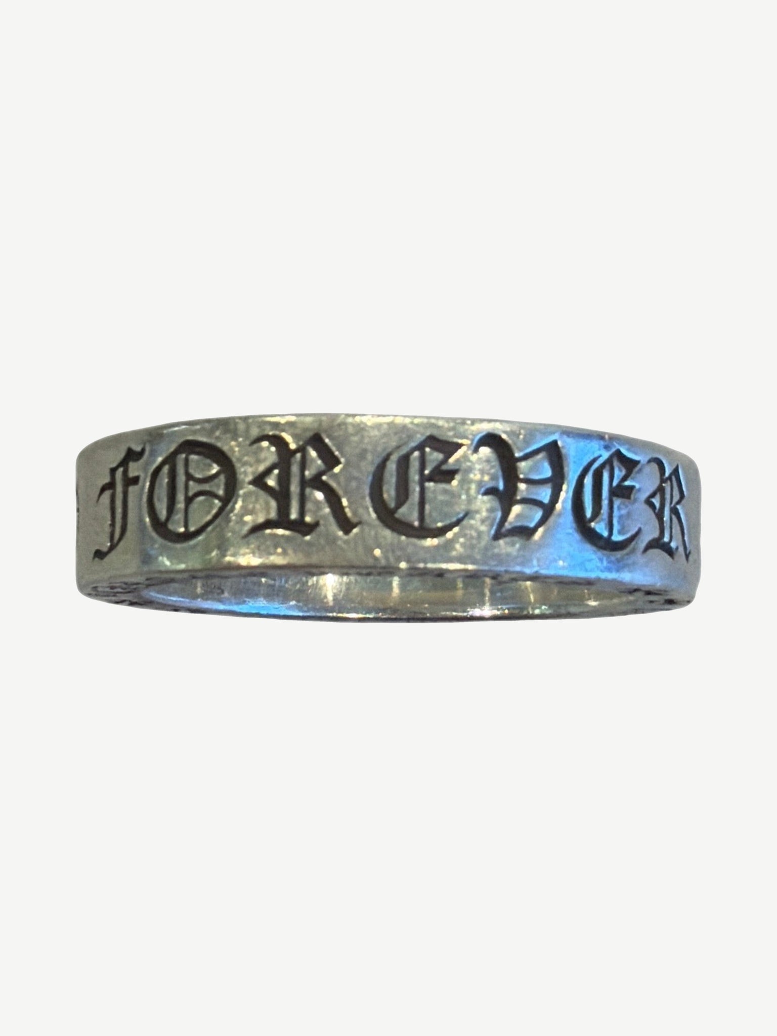 Chrome Hearts CH Forever ring side view in sterling silver with engraved gothic FOREVER text and black enamel fill