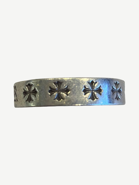 Chrome Hearts CH Forever ring side view showing row of engraved CH cross emblems around silver band