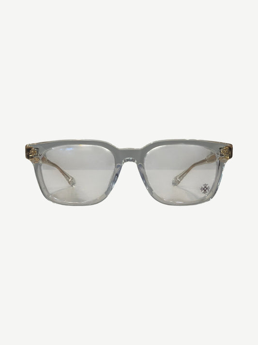 Chrome Hearts Cox Ucker eyeglasses, clear acetate frames with gold metal temple accents and dagger logo.