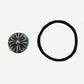 Chrome Hearts silver cross ball charm displayed beside its black elastic hair tie band