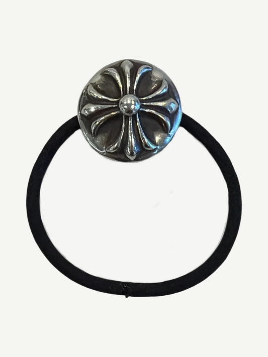 Chrome Hearts sterling silver cross ball charm hair tie on black elastic band, front view of CH motif
