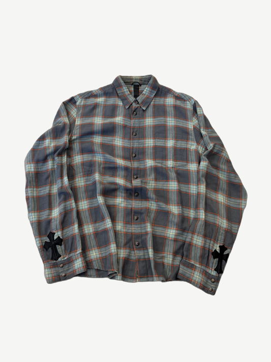 Chrome Hearts cross patch plaid flannel shirt with blue green plaid and black leather cross patches on sleeves.