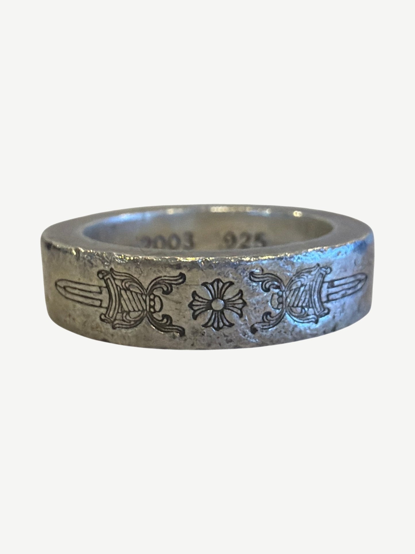Chrome Hearts sterling silver Dagger Spacer ring with engraved CH dagger motif and floral cross at center band.