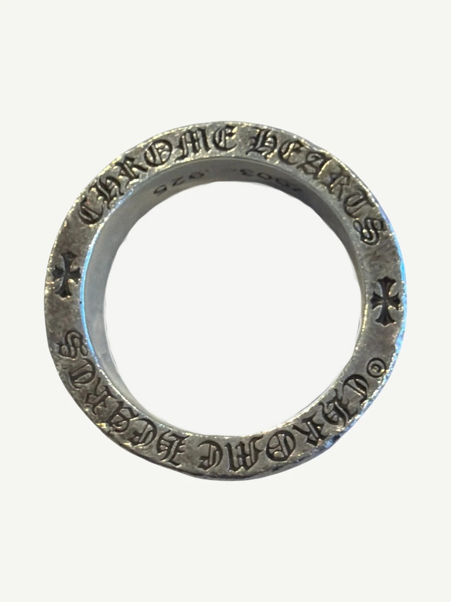 Chrome Hearts Dagger Spacer ring top-down view with gothic CHROME HEARTS engraving and cross stamps inside band.