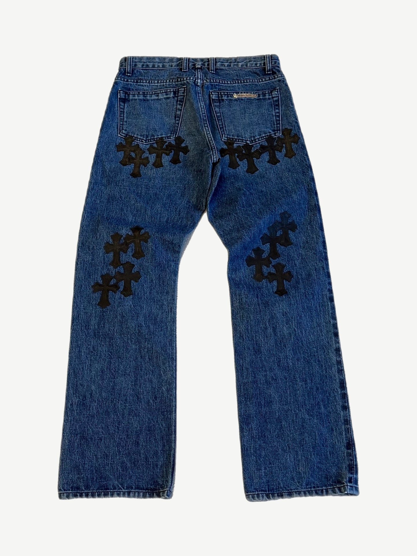 Chrome Hearts dark wash cross patch jeans back, indigo denim with black leather cross detailing