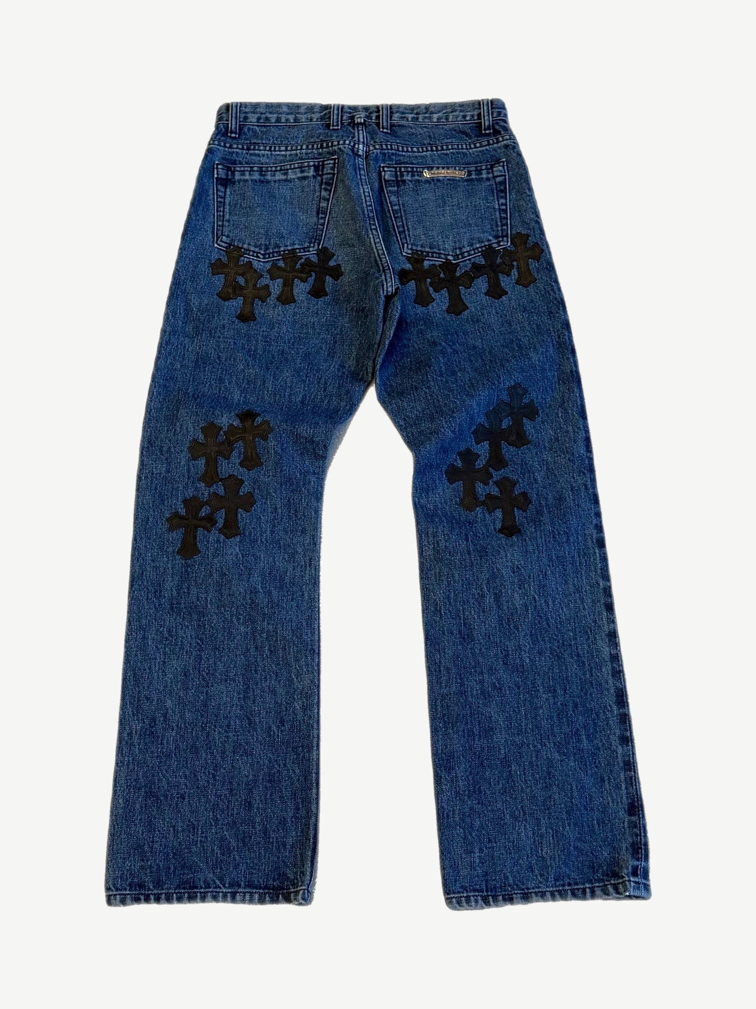 Chrome Hearts dark wash cross patch jeans back, indigo denim with black leather cross detailing