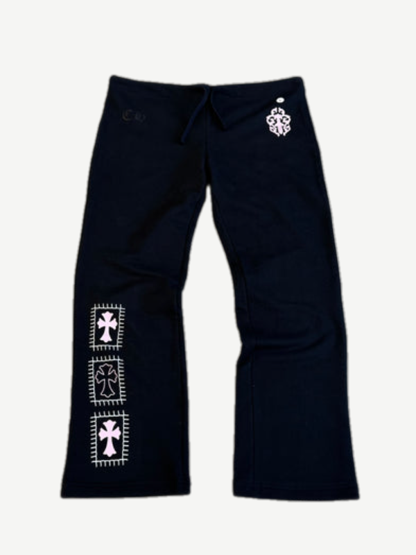 Chrome Hearts black sweatpants with three stacked white cross patches on left leg and CH waist logo, front view