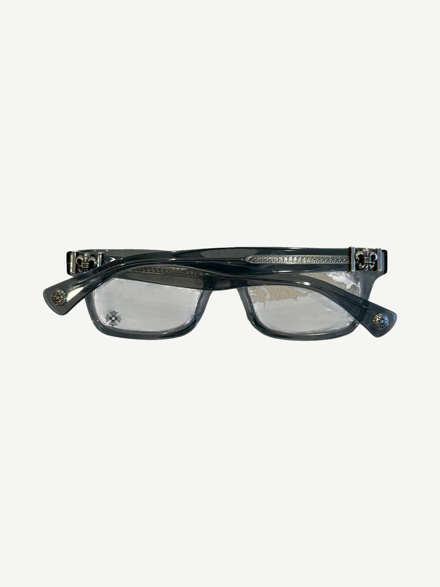 Chrome Hearts Gittin Any? glasses folded view, grey translucent acetate frames with smoke tinted lenses.