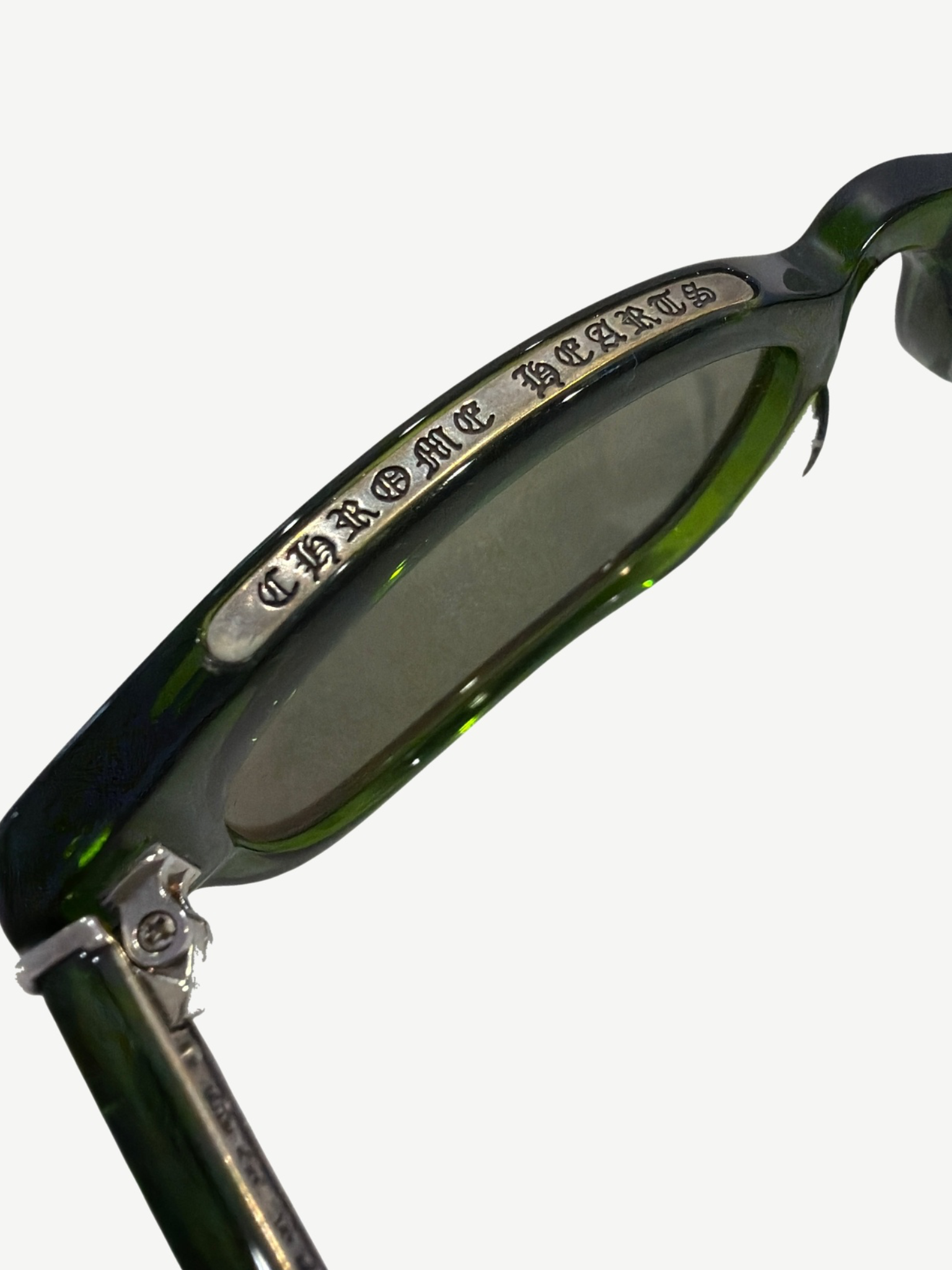 Chrome Hearts Lowrider green sunglasses three-quarter angle showing rectangular acetate frame