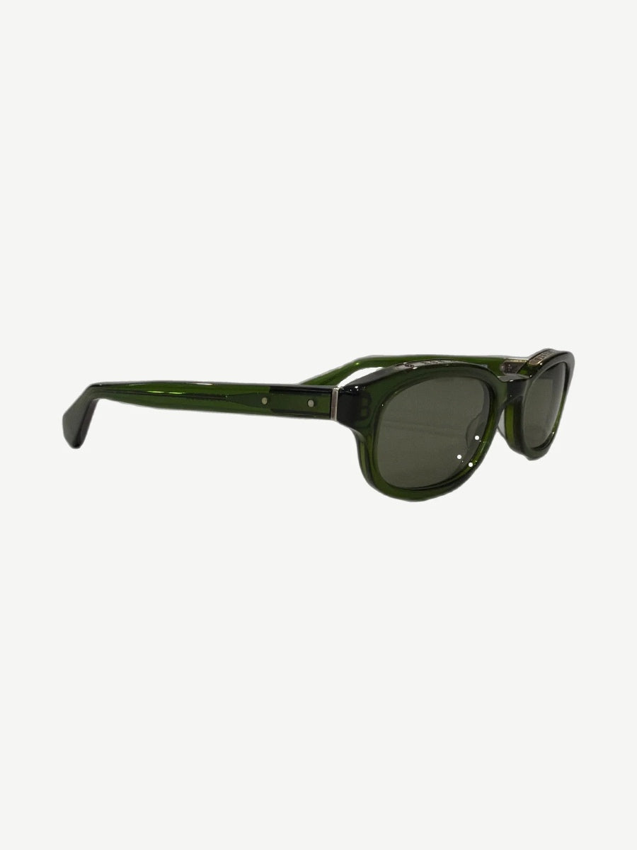 Chrome Hearts Lowrider translucent dark green sunglasses front view with silver CH side plaques