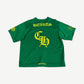 Chrome Hearts green mesh jersey back, large yellow HEARTS arch over Old English CH and numbered yellow sleeves.