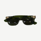 Chrome Hearts Sitonit sunglasses detail of green acetate temple arm with engraved silver hinge plaque