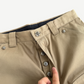 Chrome Hearts khaki carpenter pants laid flat showing tan canvas fabric and double-knee utility paneling