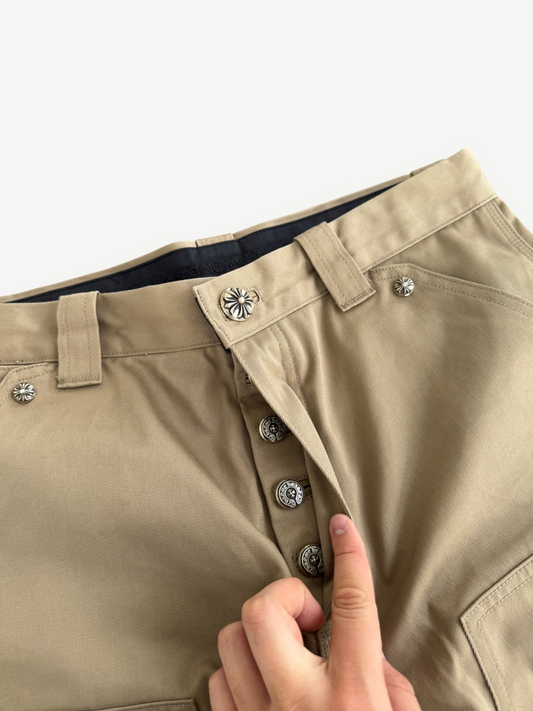 Chrome Hearts khaki carpenter pants laid flat showing tan canvas fabric and double-knee utility paneling