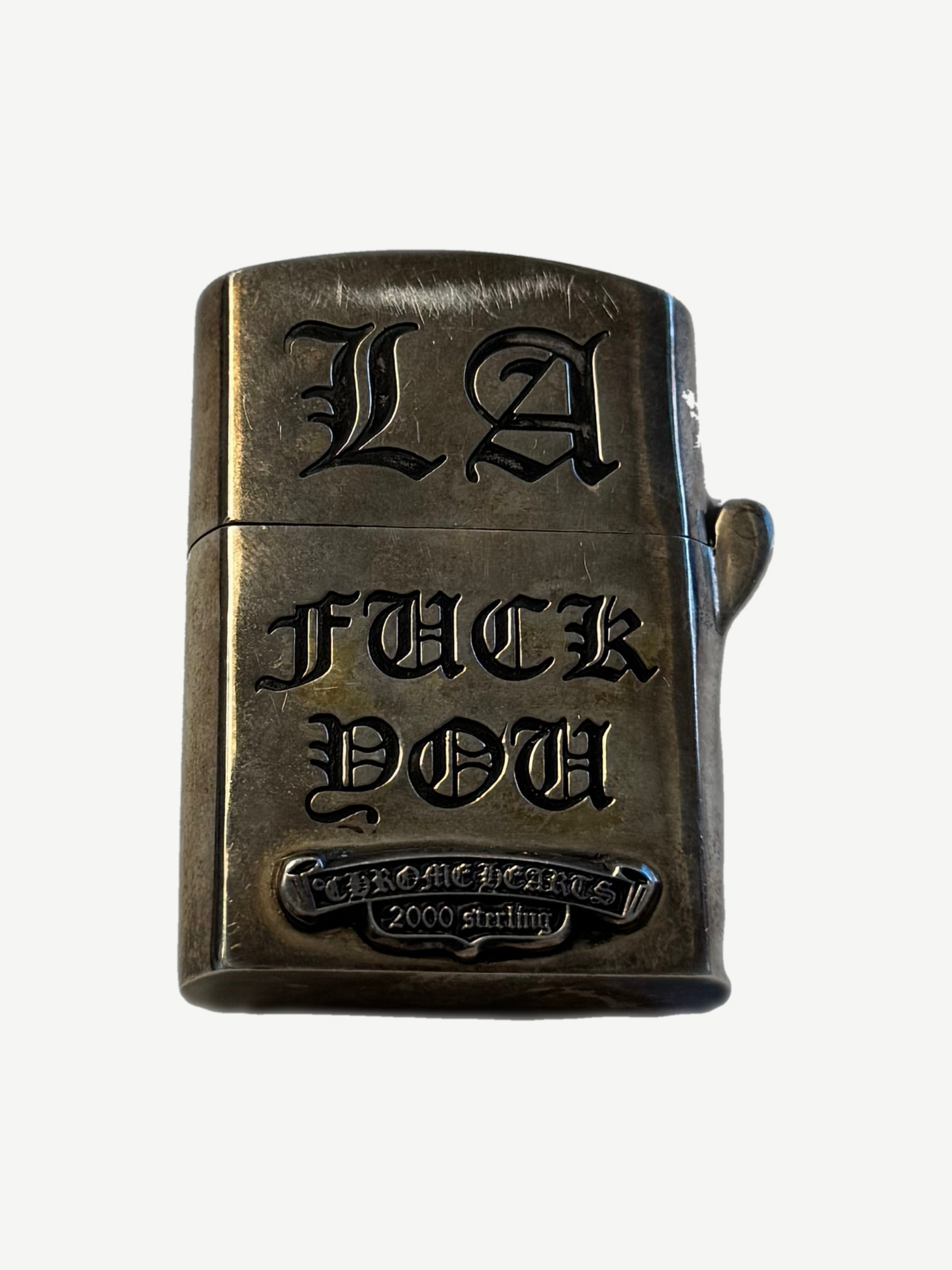 Chrome Hearts sterling Zippo lighter back engraved with LA Fuck You in Old English and 925 sterling plaque