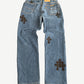 Chrome Hearts Levis 517 dark wash bootcut jeans back showing classic Levis pockets and custom leather Chrome Hearts patch