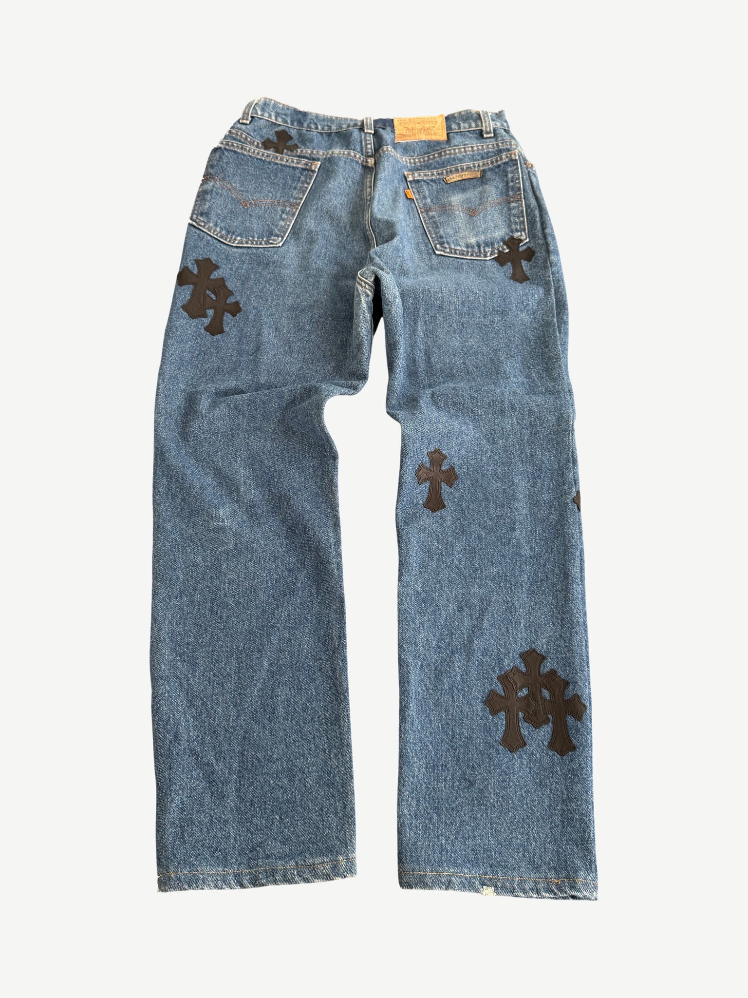 Chrome Hearts Levis 517 dark wash bootcut jeans back showing classic Levis pockets and custom leather Chrome Hearts patch