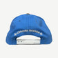 Chrome Hearts light blue cap back with white Chrome Hearts gothic script, cross flares, and snapback closure.