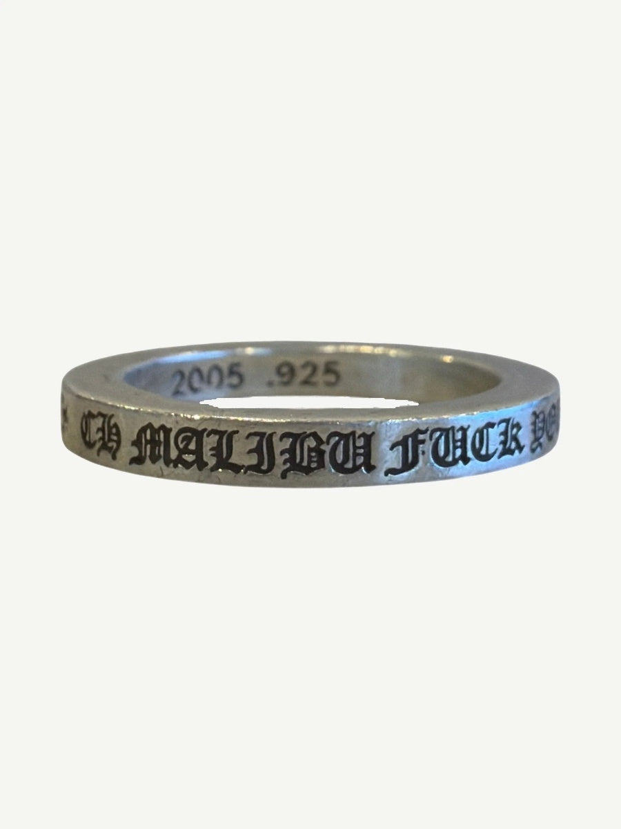 Chrome Hearts sterling silver Malibu Fuck You spacer ring with gothic black-enamel engraved lettering.