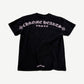 Back of Chrome Hearts Matty Boy black tee with pink Chrome Hearts USA arched shoulder logo print
