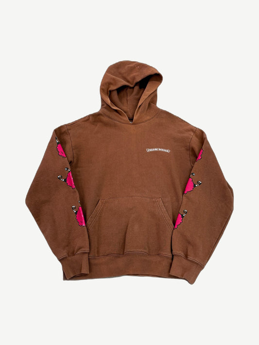 Chrome Hearts Matty Boy brown hoodie front with pink dagger sleeve prints and small CH chest banner logo