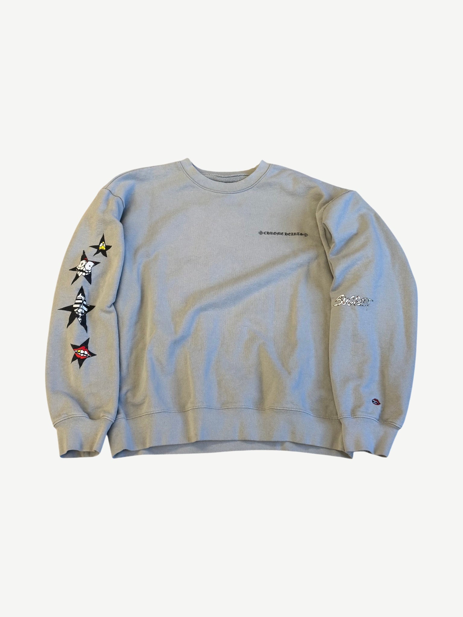 Chrome Hearts Matty Boy gray Suggest crewneck front with small chest logo and cartoon star sleeve graphics