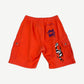 Chrome Hearts orange Matty Boy cargo shorts back showing Sick Heart On Fire pocket and flame leg graphic.