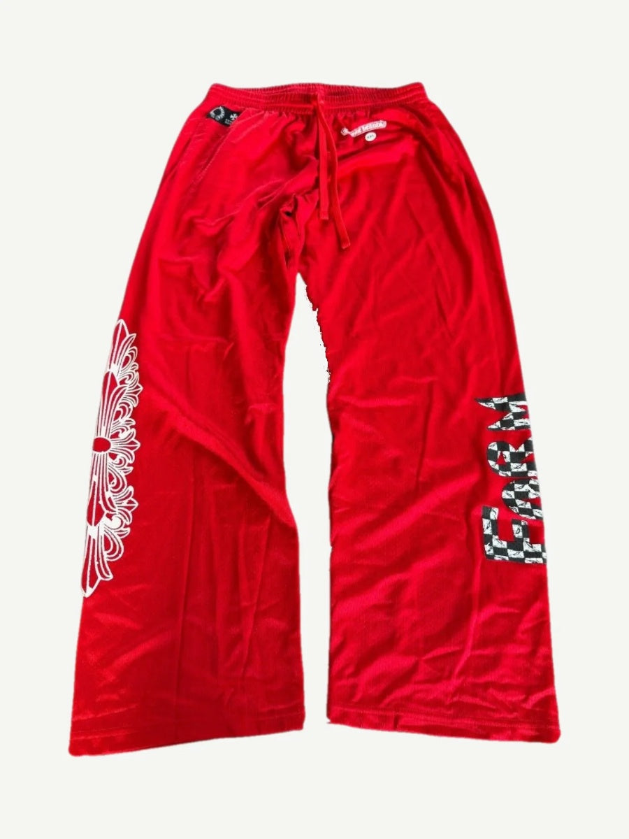 Chrome Hearts Matty Boy red mesh sweatpants flat view, perforated fabric with FORM graphic detail