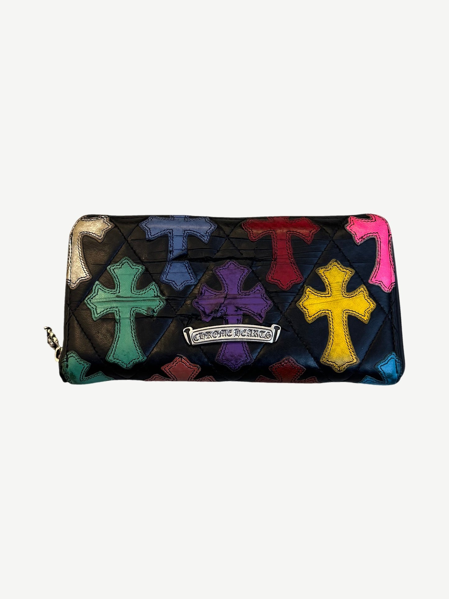 Chrome Hearts long wallet exterior in black leather with multicolor cross patch panel and snap closure.