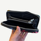 Chrome Hearts long wallet back panel in soft black leather with subtle gothic CH heart stamp logo.